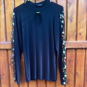 Elegant Black Women's Top with Floral Accents